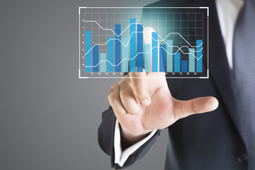 businessman hand working with modern technology and digital layer effect as business strategy concept