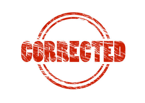 corrected vintage red rubber stamp isolated on white background