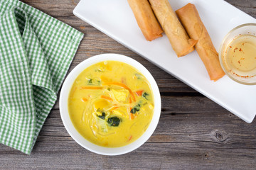 delicious thai curry coconut chiken soup bowl