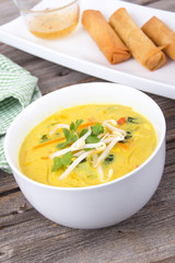 delicious thai curry coconut chiken soup bowl