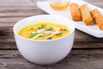 delicious thai curry coconut chiken soup bowl