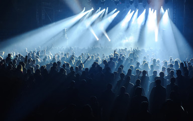 Crowd raising their hands and enjoying great festival party or concert