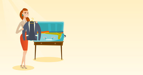 Young caucasian white woman packing her clothes in an opened suitcase. Woman putting a jacket into a suitcase. Cheerful woman preparing for vacation. Vector cartoon illustration. Horizontal layout.