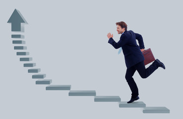 Businessman up the staircase over white background. ready for your design.