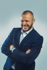 Headshot of successful smiling cheerful american businessman executive stylish company leader