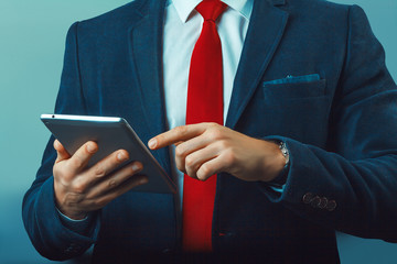 Young contemprary businessman, overlooking pensive - business, serious, technology concept