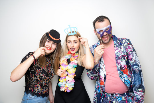 Three People Girls Man Posing Party Props Photo Booth White Plain Background Studio Hat