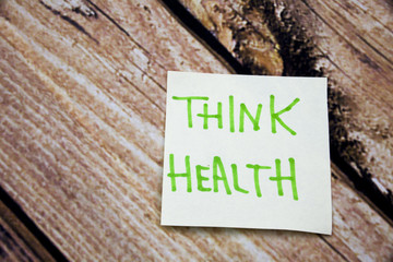 Naklejka premium Memo note on Sticky note Think Health, think about Helath