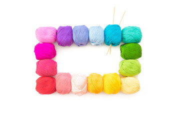 Colored balls of yarn. View from above. Rainbow colors. All colors. Yarn for knitting. Skeins of...