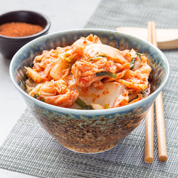 Kimchi cabbage. Korean appetizer in a bowl, square