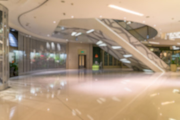Abstract blur and defocused shopping mall in department store interior for background