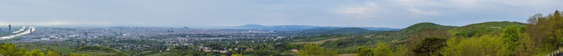 Fototapeta na wymiar panorama of vienna with the suburbs and river danube