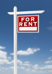 Right Facing For Rent Real Estate Sign on a Blue Sky with Clouds.