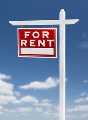 Left Facing For Rent Real Estate Sign on a Blue Sky with Clouds.