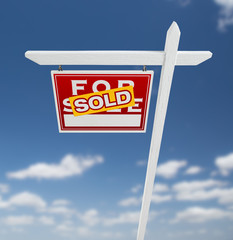 Left Facing Sold For Sale Real Estate Sign on a Blue Sky with Clouds.