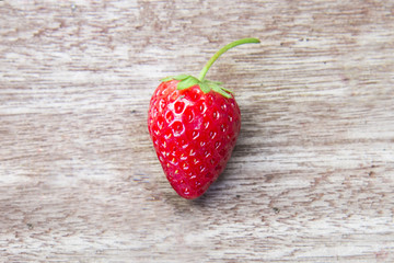 Fresh strawberries on wooden table,Red strewberry prepatation to make Strawberry Juice.Healthy and delicious organic fruit