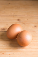 Organic eggs on wood. Fresh eggs.