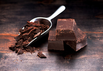 Chocolate on a dark wooden background