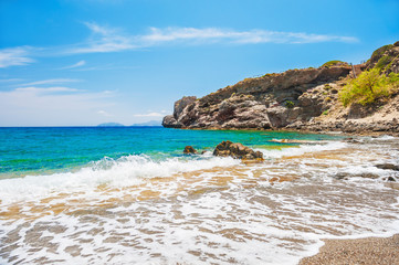 Crete island, Greece. Beautiful beach with clear turquoise water and rocks.