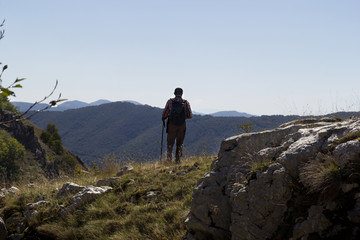 hiker on mountain peak on matese park
