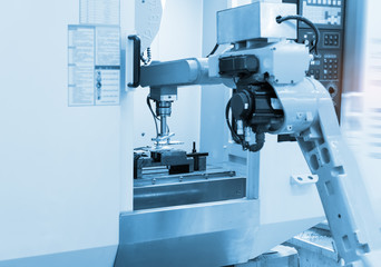 Modern technology for manufacturing.robot with vacuum suckers picks the item from the conveyor