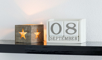 White block calendar present date 8 and month September