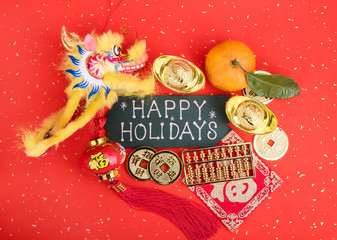 happy Holiday written on Chinese new year ornament background