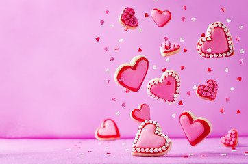 Heart shape flying sugar cookies with pink glaze for Valentine's Day