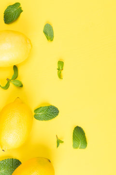 vertical yellow background, with fruits and mint, lemon