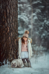 Young girl portrait with cat 