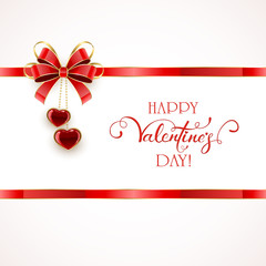 Red bow with hearts on white background