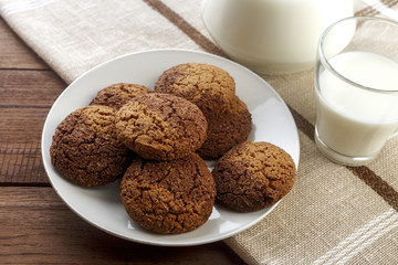 oatmeal cookies with a glass of milk