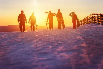 Papier Peint photo Sports dhiver Friends with ski and snowboards walking to sunset