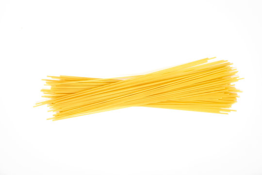 Uncooked pasta spaghetti macaroni isolated on white background