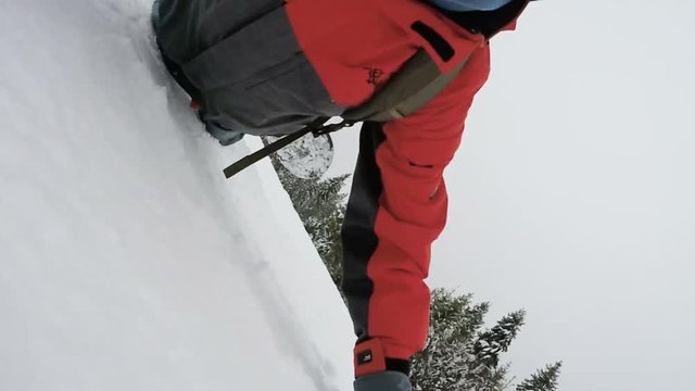 Active guy training on snowboard, falling face down in snow, funny winter video
