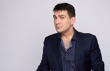 doubting man looking at camera