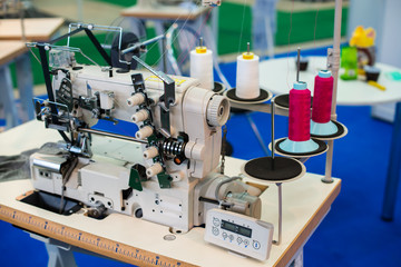 Industrial sewing machine close-up, shallow dof