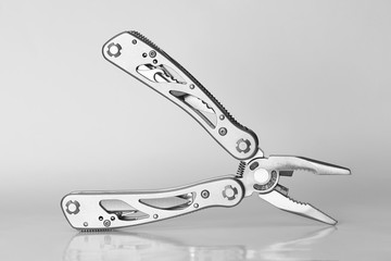 Steel multitool isolated