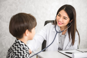 Asian woman doctor, check up heartbeat of kid, healthcare and medical for kid concept