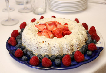 delicious crown of nougat ice cream decorated with berries