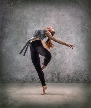 Woman dancer, in beautiful dynamic jump action figure on the gru