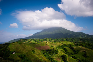 Obraz na płótnie Canvas Scenic view of Mt. Iraya at Vayang Rolling Hills, Batanes, Philippines