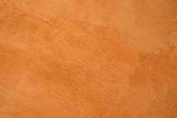 the cement is painted in orange background .