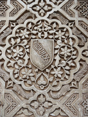 Arabic decoration in plaster. Alhambra of Granada, Andalusia, Spain