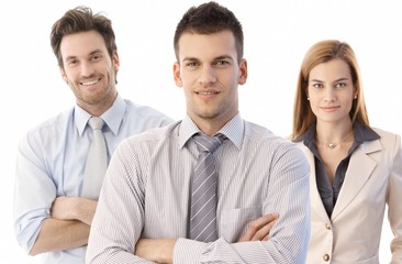 Young business team lead by happy businessman