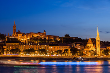Budapest City From Danube River At Night In Hungary