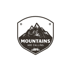 Vintage hand drawn mountains emblem. The great outdoor patch. Mountains are calling sign quote. Monochrome and grunge letterpress effect. Stock vector badge illustration isolated on white background