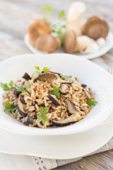 Risotto integrale con funghi e prezzemolo 
