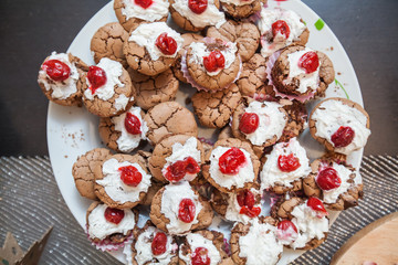 Choco Muffins with cherry  homemade dessert served on table