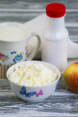 cottage cheese in a bowl on a wooden table